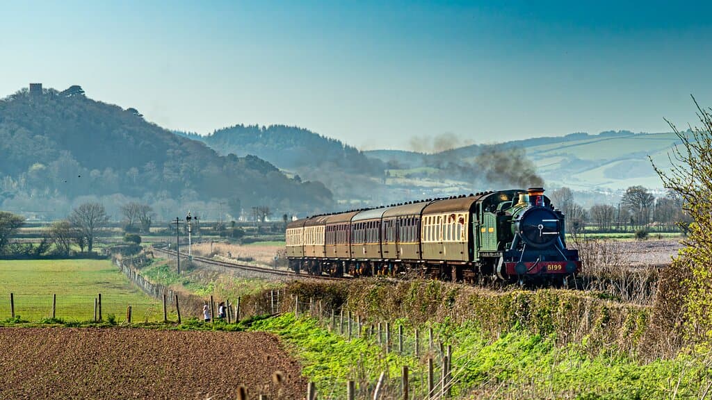 Steam Locomotive travelling between Dunster and Blue Anchor on West Somerset Railway. Photo Credit Mike Lanning
