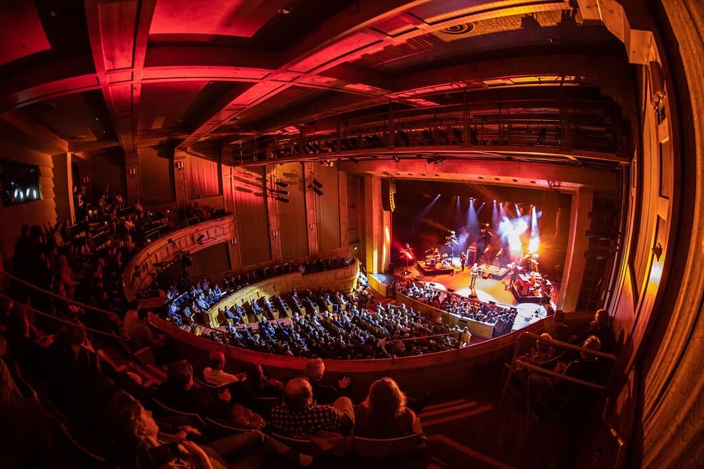 The Vilar Performing Arts Center is a world-class, nonprofit theater nestled in the heart of Beaver Creek Resort, a scenic 10-mile drive from Vail. As one of the premier entertainment venues in the Vail Valley, the Vilar presents a year-round calendar of captivating live performances. Discover a diverse lineup of events, including chart-topping concerts, acclaimed Broadway productions, laugh-out-loud comedy shows, mesmerizing dance performances, and inspiring classical music.