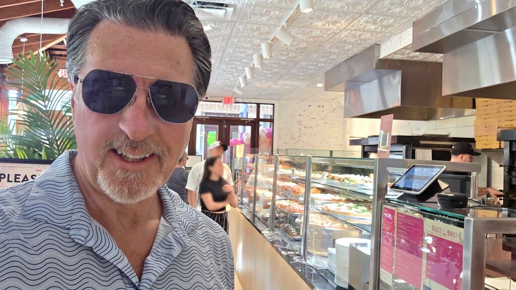 ROSARIO S. CASSATA AT THE SLICE SHOP IN DOWNTOWN NAPLES FLORIDA.
