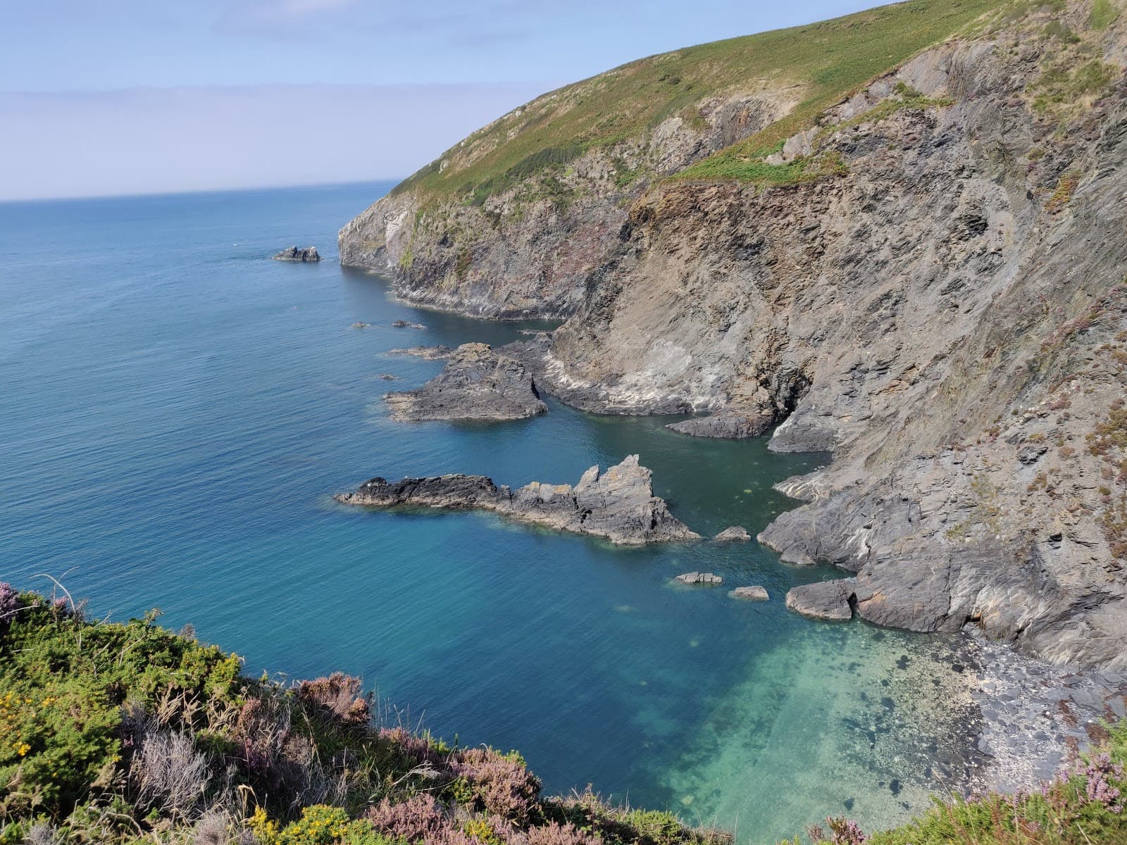 Dinas Head Coast Walk - Image 1