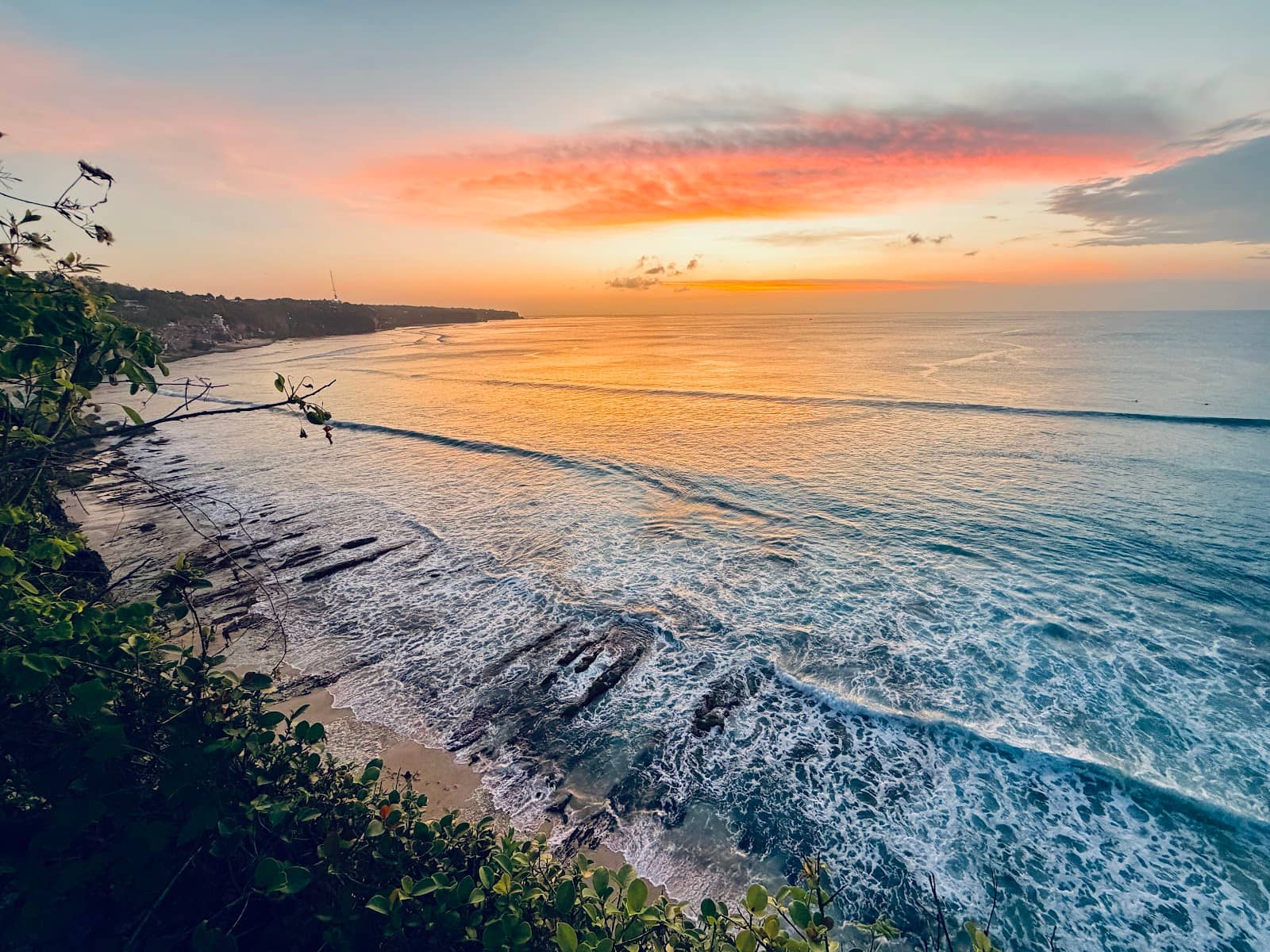 Surfers Catching the Last Waves