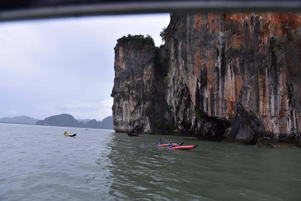 Sea Canoeing Through Caves