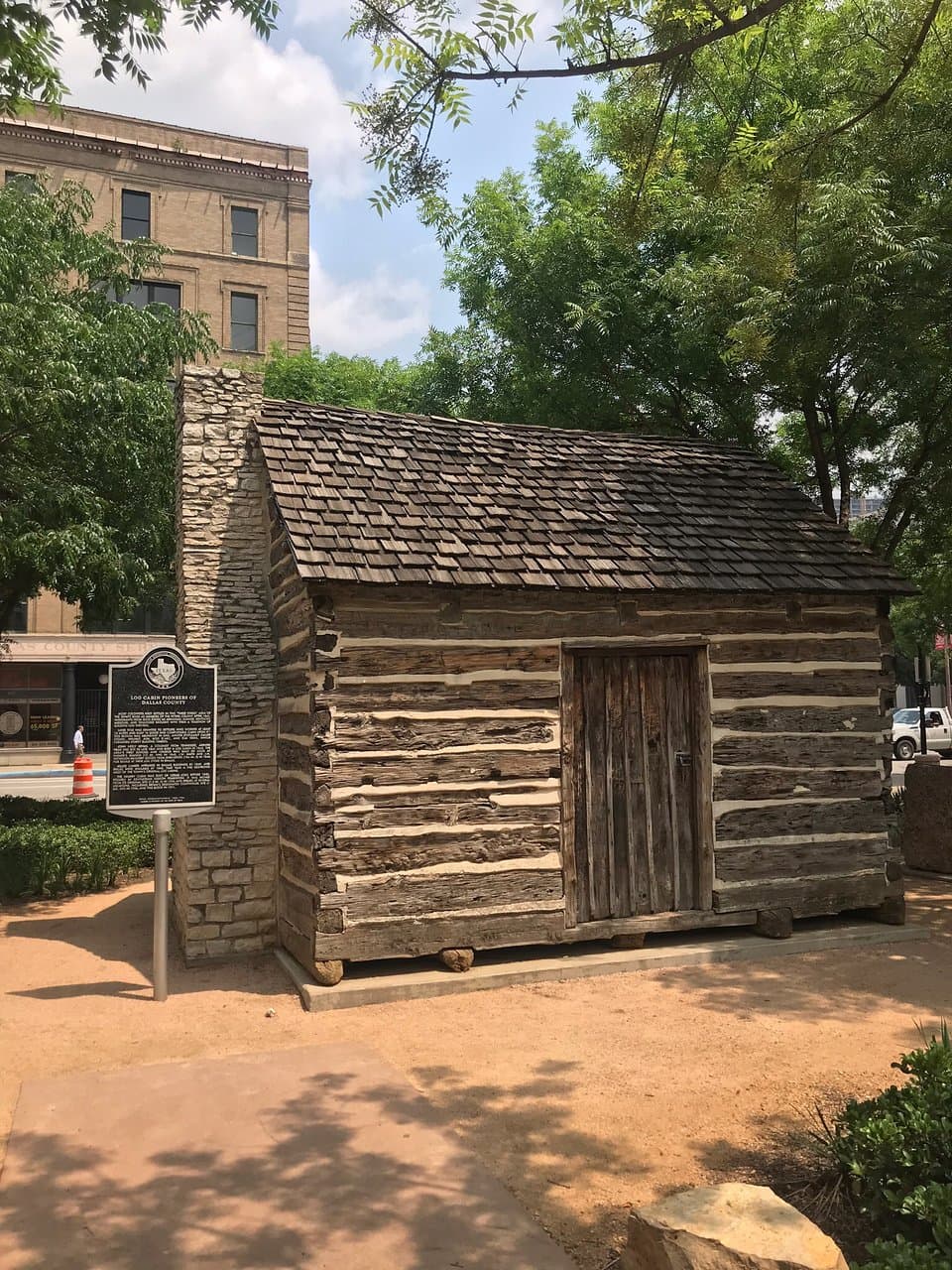Founders Plaza and John Neely Bryan Cabin