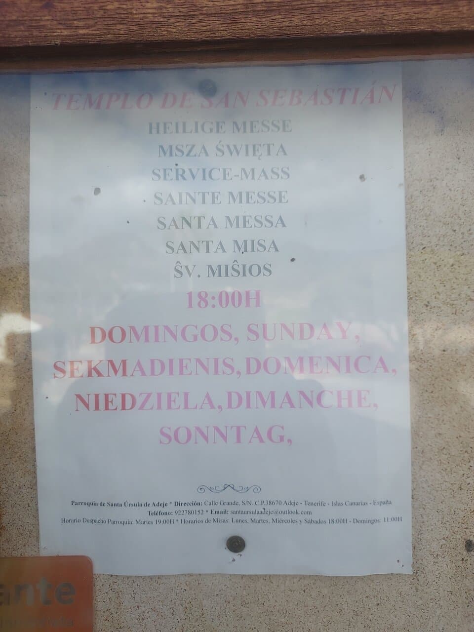 Poster outside Church of San Sebastien showing the only weekend mass is at 6pm on Sunday evenings in Spanish.