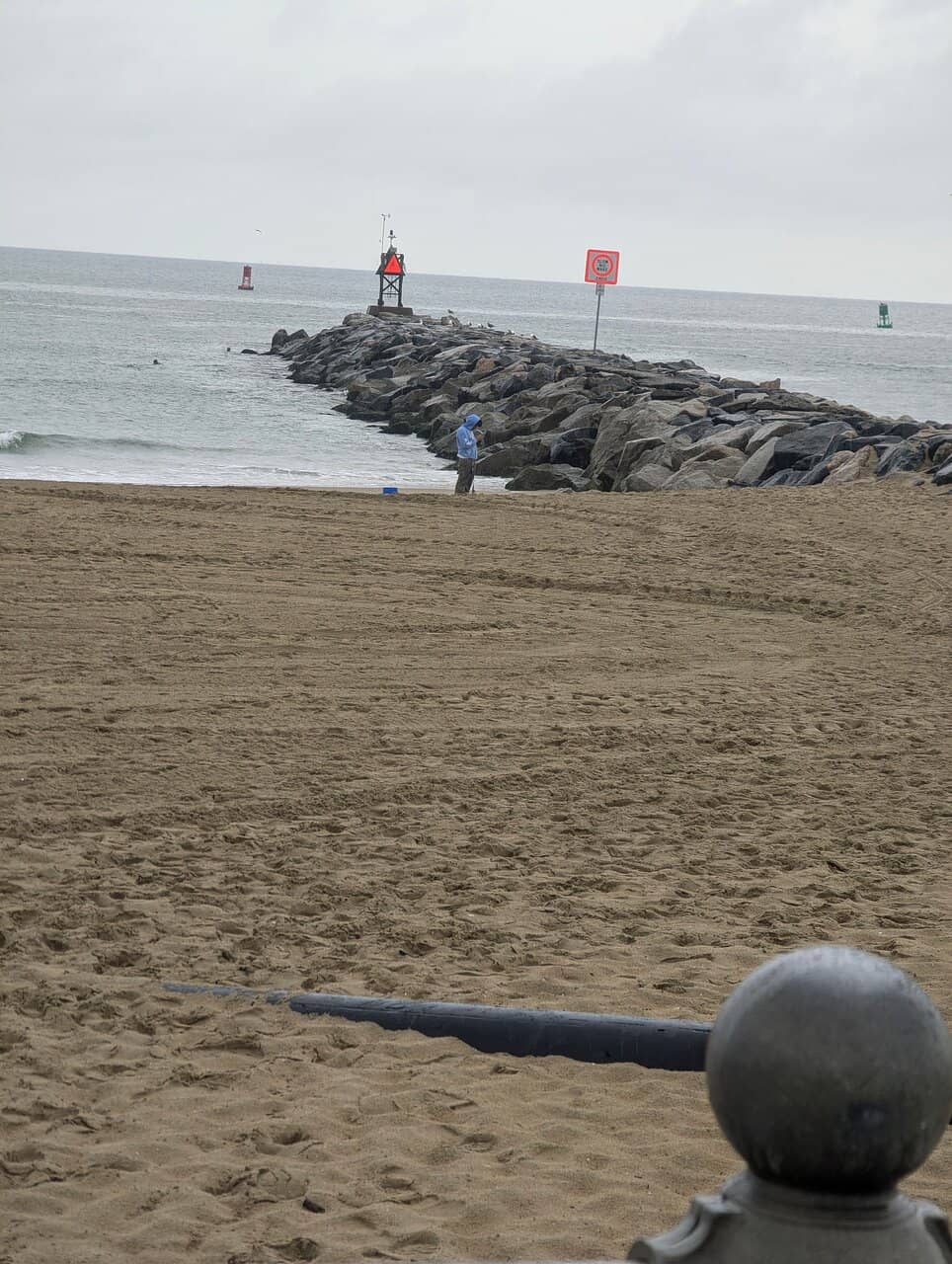Surfing the Inlet Jetty
