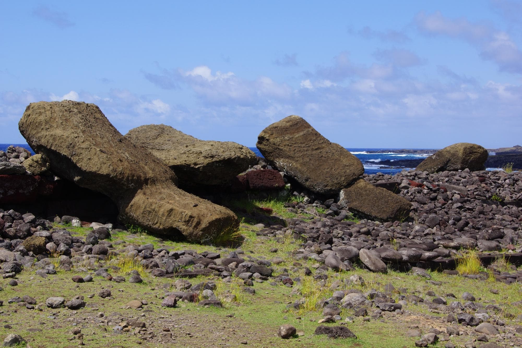 Moai fallen face down at left and middle