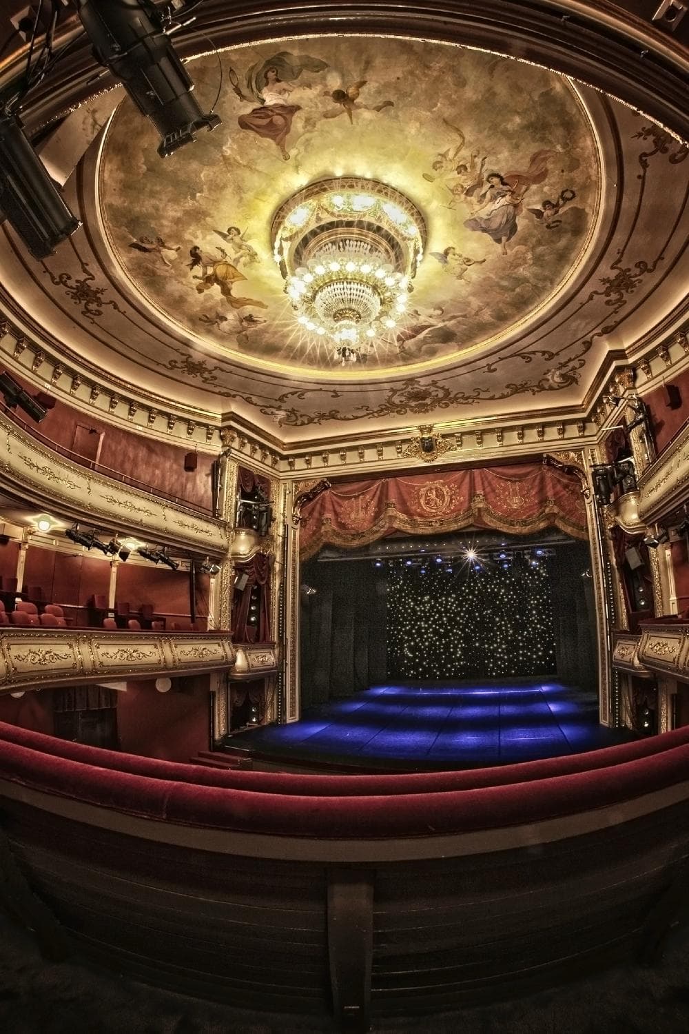 The beautiful auditorium decorated in red and gold.