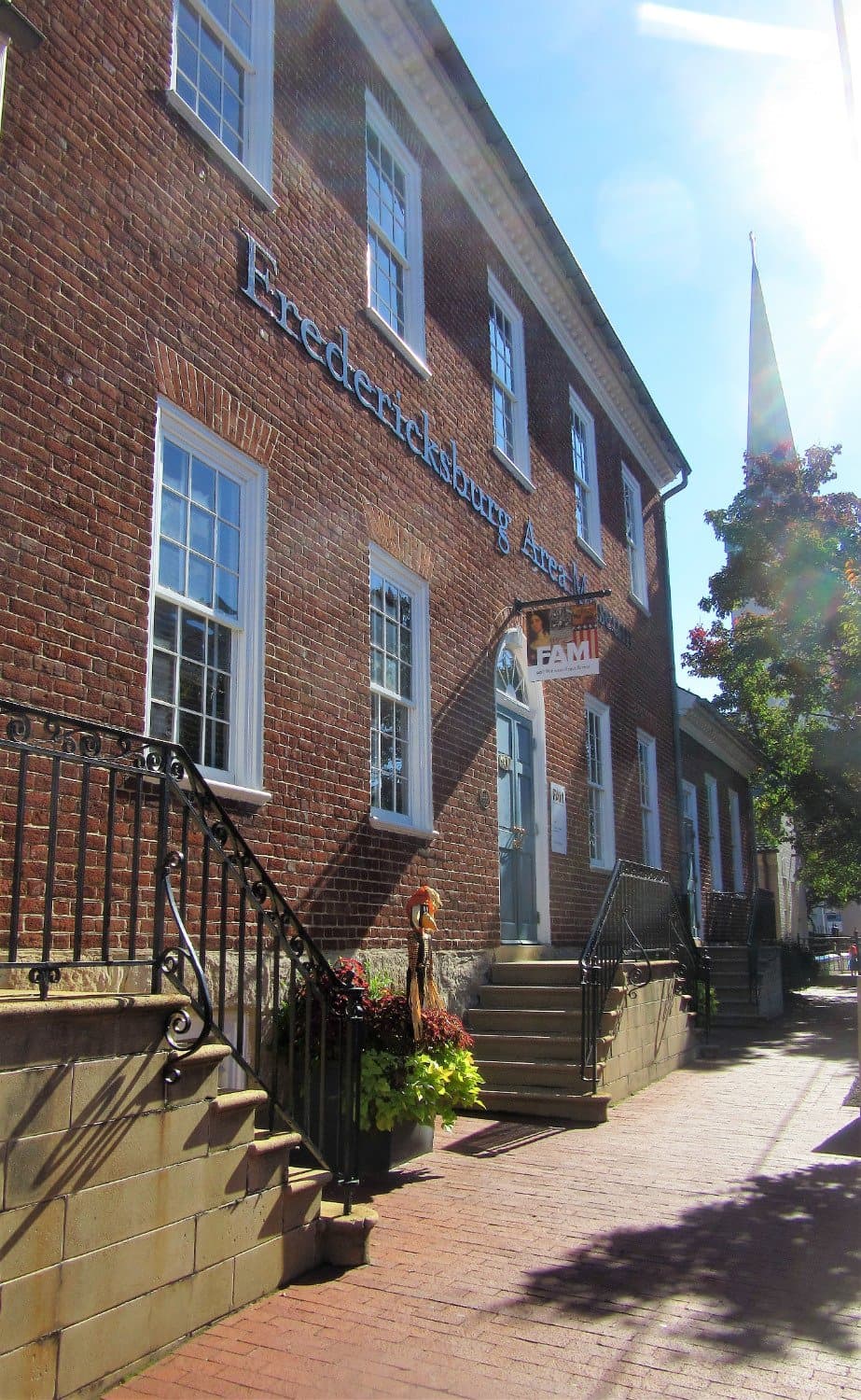 Entrance to the museum where the sign is.