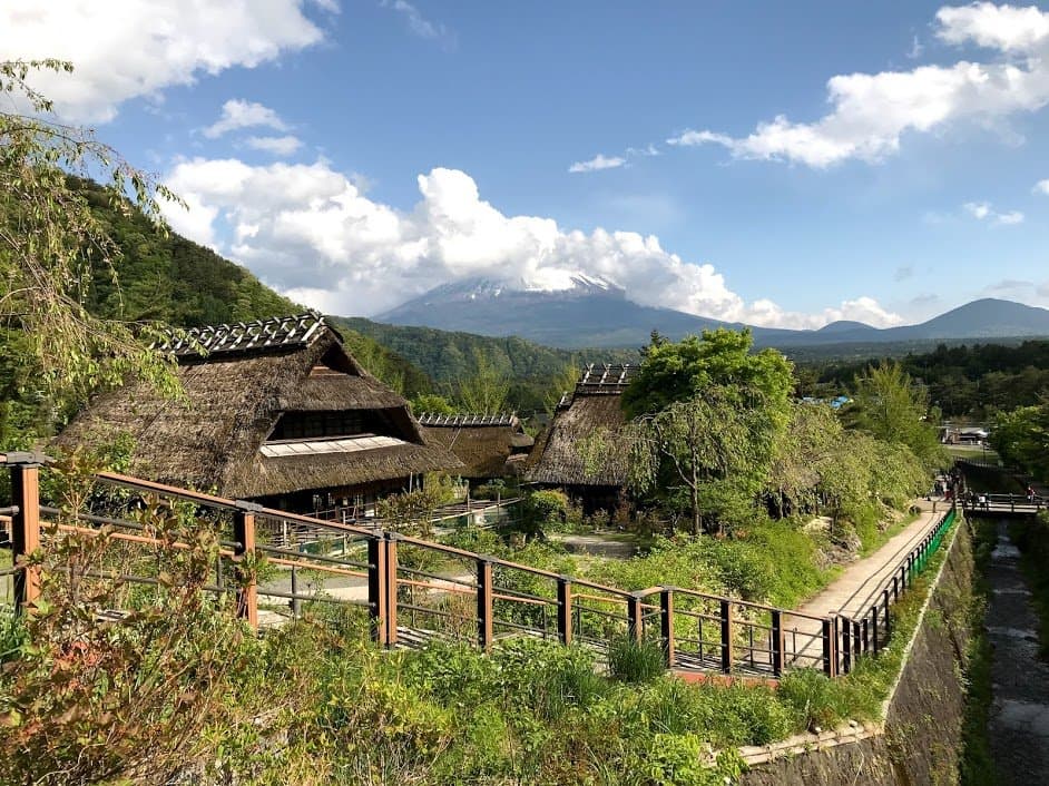 a small stream runs off from the top of mountains