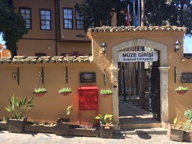 In Old Town, not next to the Antalya Archaeological museum. Across from the Aspen Hotel