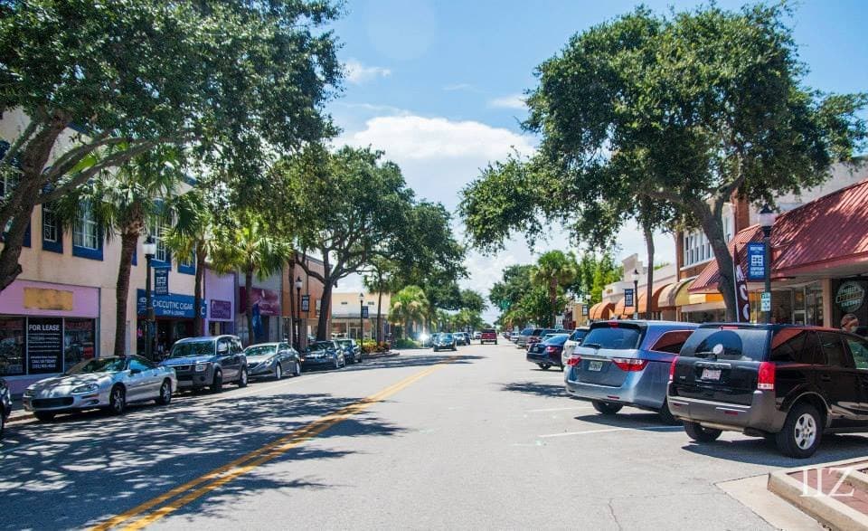 Stop in some of the quaint shops along the tree-lined streets.