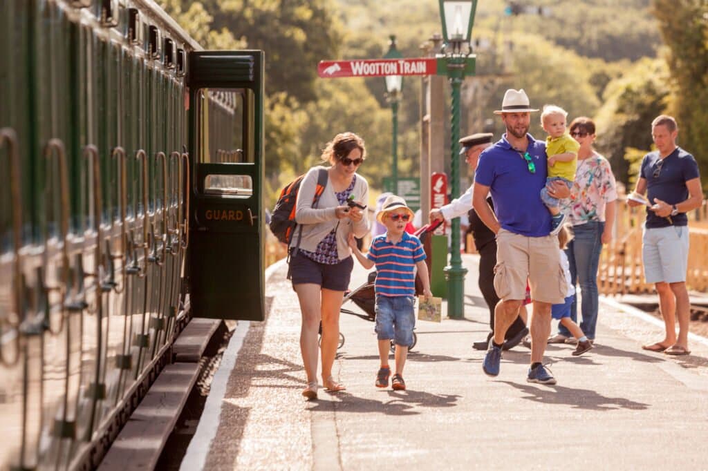 A family ready to board their train at Havenstreet Station