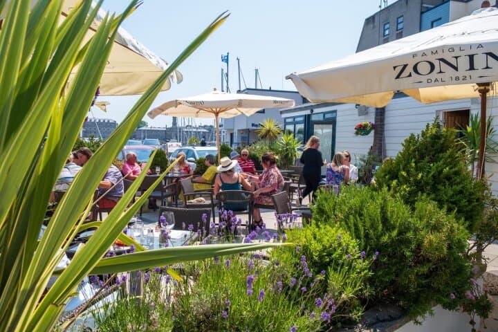 Step into our waterside Bar and Bistro, nestled in the picturesque Mayflower Marina of Plymouth. Here, you'll discover a tranquil ambiance complemented by a sun-soaked terrace, providing enchanting views of the Marina and the Royal William Yard.