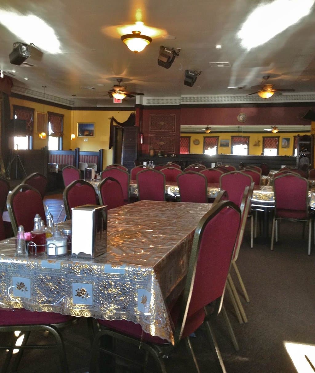 Many long tables for groups, but booths available along the walls