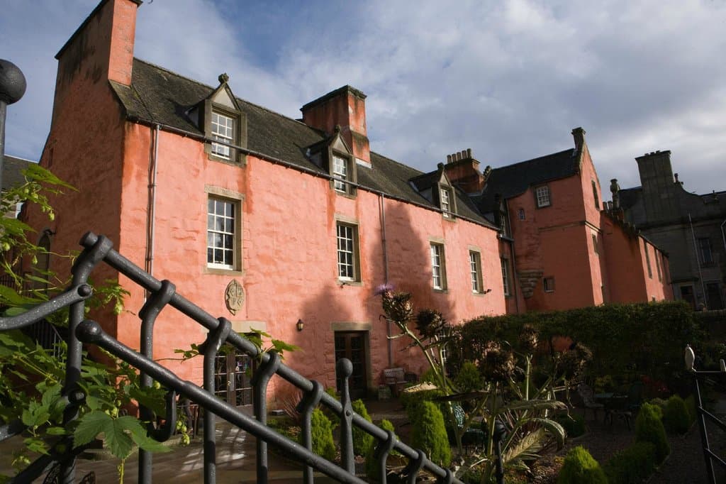 Abbot House's beautiful medieval walled garden is adjacent to the Abbey grounds