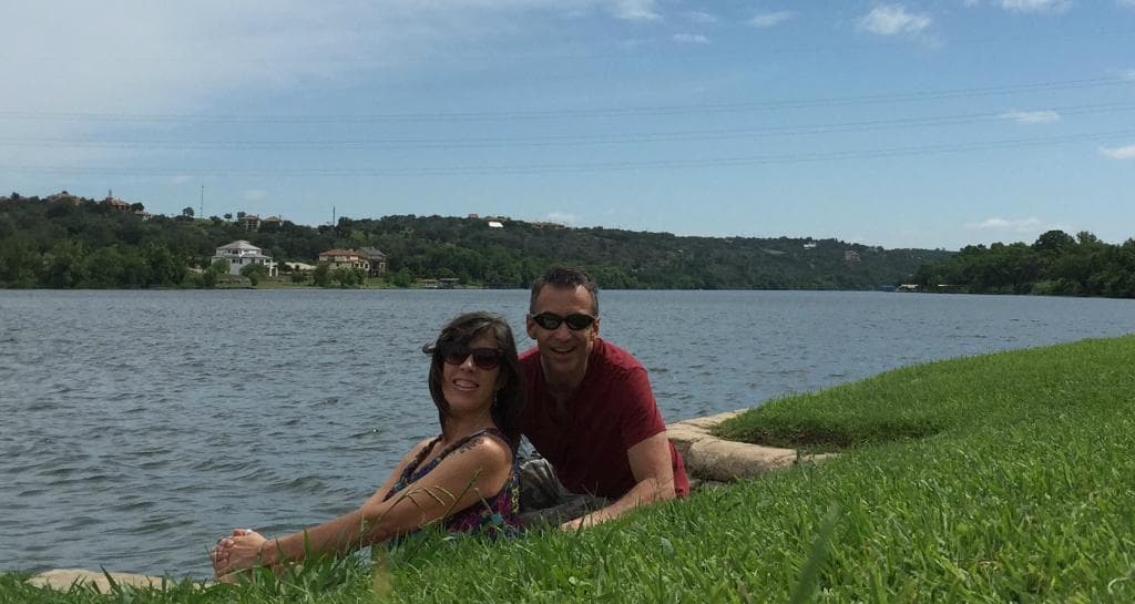 Us sitting on the steps by the lake