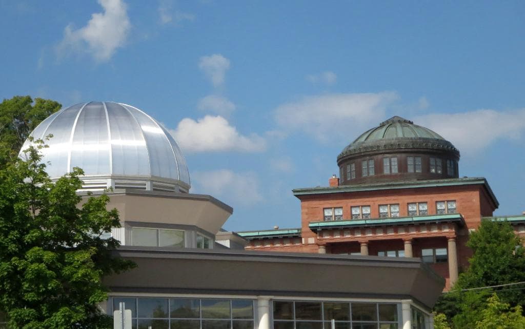 The dome of the history museum, on the left, honoring the classic dome of the County Courthouse