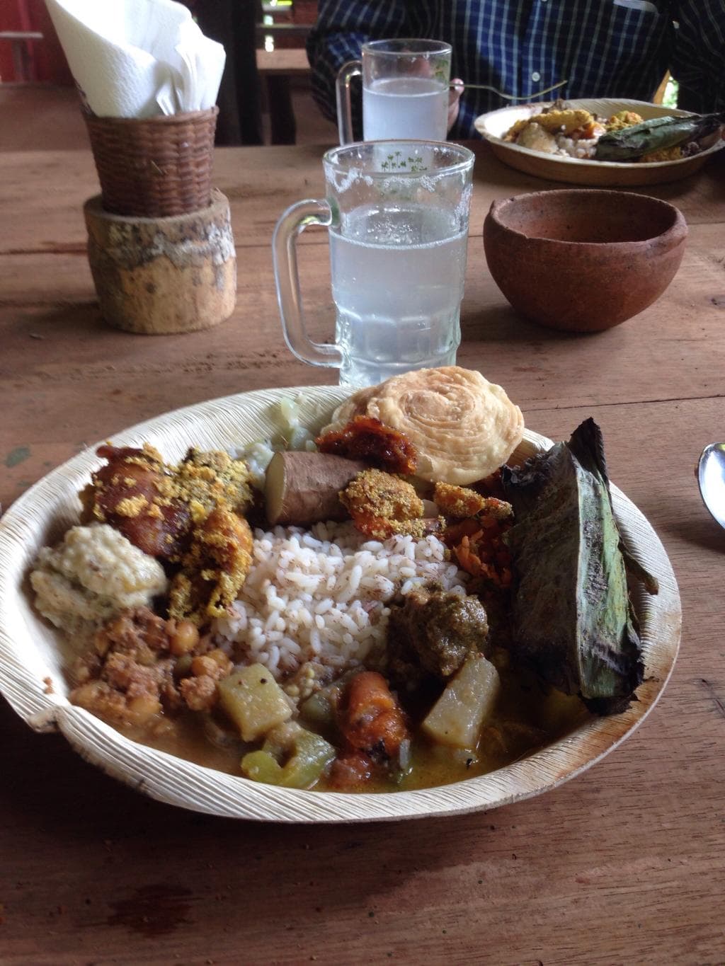 Traditional Goan food served on plates made from beetle but leaf.