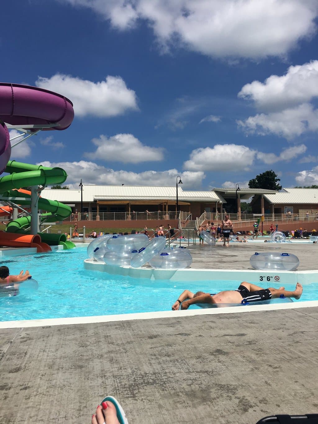 Slides are in the center and the lazy river is positioned around it.