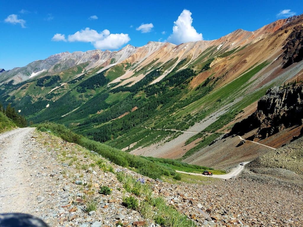 The shelf road. Make sure no one is coming from the other way before going over.