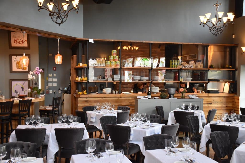 Spiga's nighttime vibe is rustic luxe meets elegant farmhouse.