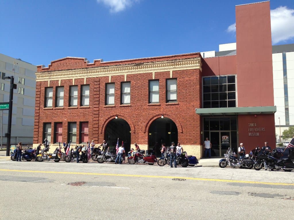 Motorcycle riders stopping to visit the museum