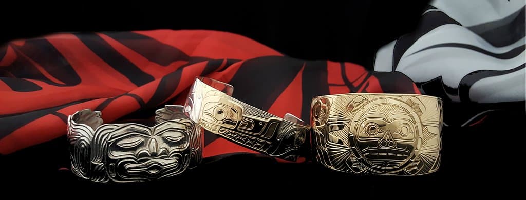 Dzunukwa by William Cook - Wolf With 14K Gold by Chris Cook - Raven and Sun 14K Gold by William