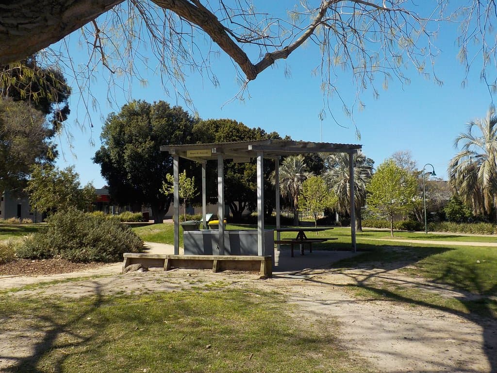 Sheltered BBQ and picnic table