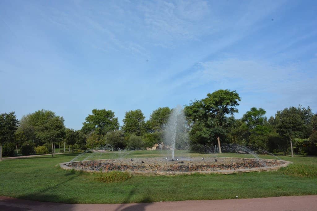 The Serene Pond and Fountain