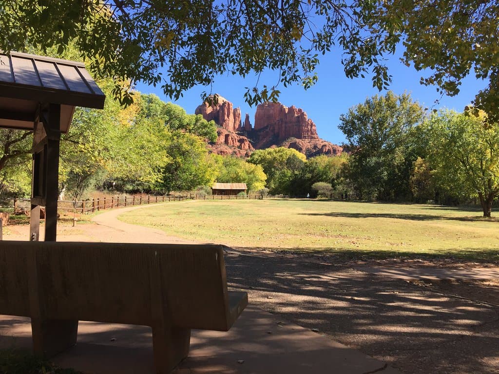 Take in the view of Cathedral Rock from the Day Use Area at Crescent Moon. Picnic tables, trails, restrooms, and sitting benches in the sun and shade are provided.
