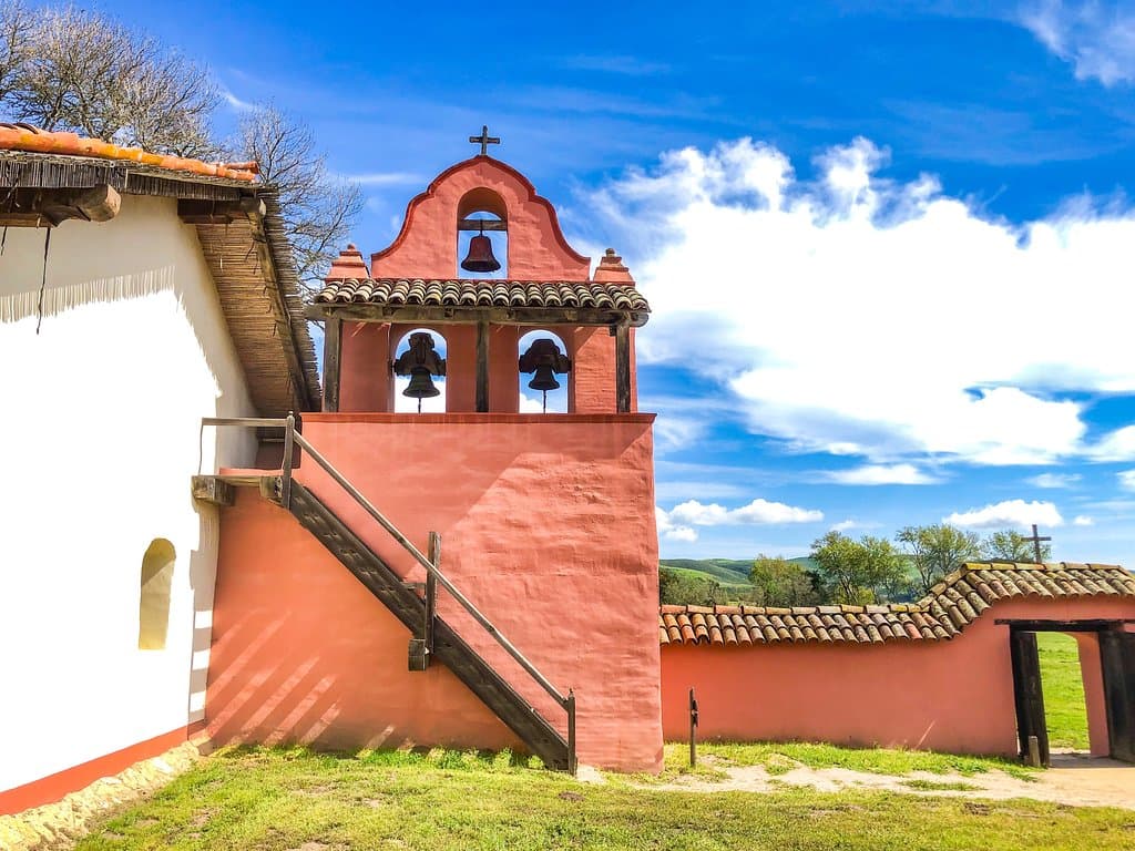 Bell tower (campanario) from inside graveyard courtyard