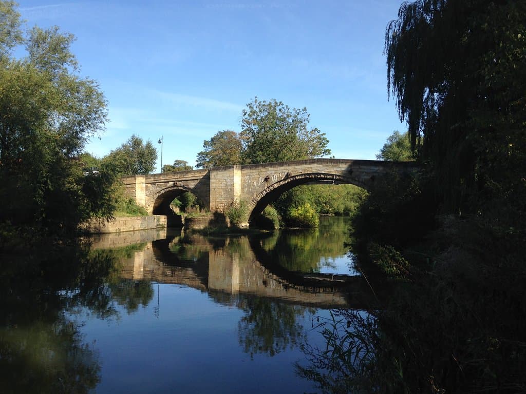 View towards road bridge from banks of the Derwent