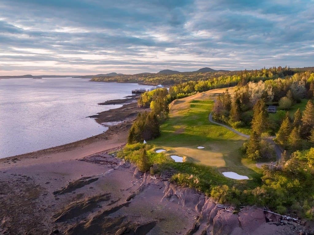 View from above the passamaquoddy bay looking up the 13th holes from green to tee.