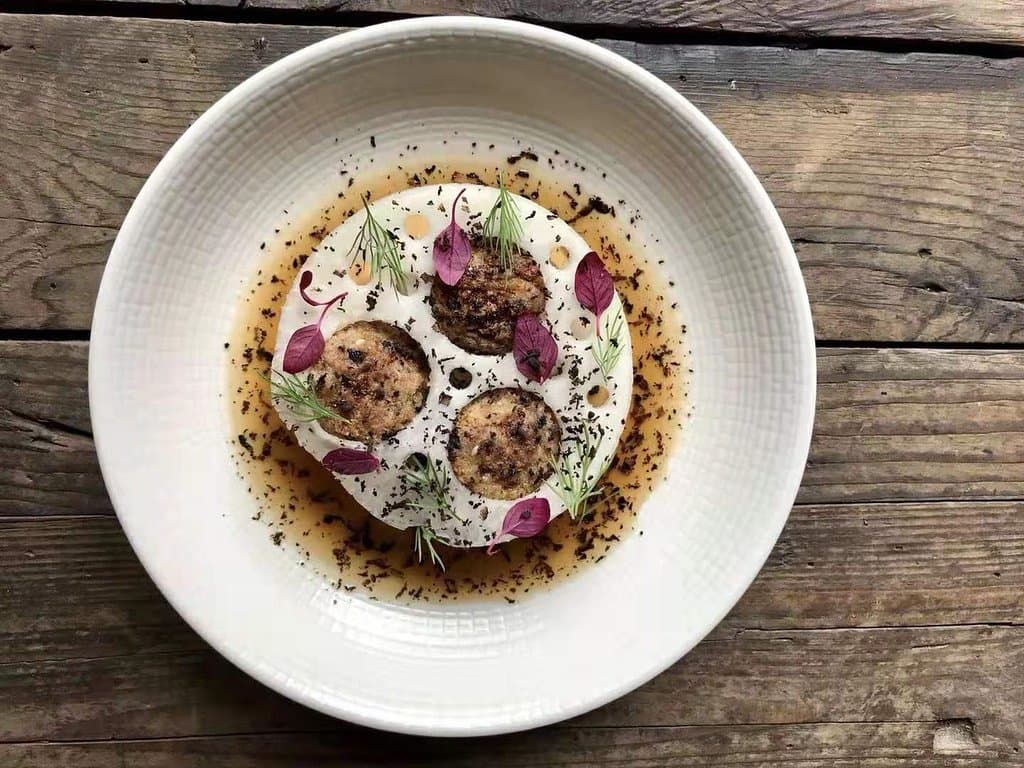 Brown buttered wagyu meatballs, celeriac puree, ginger-miso dressing, kohlrabi