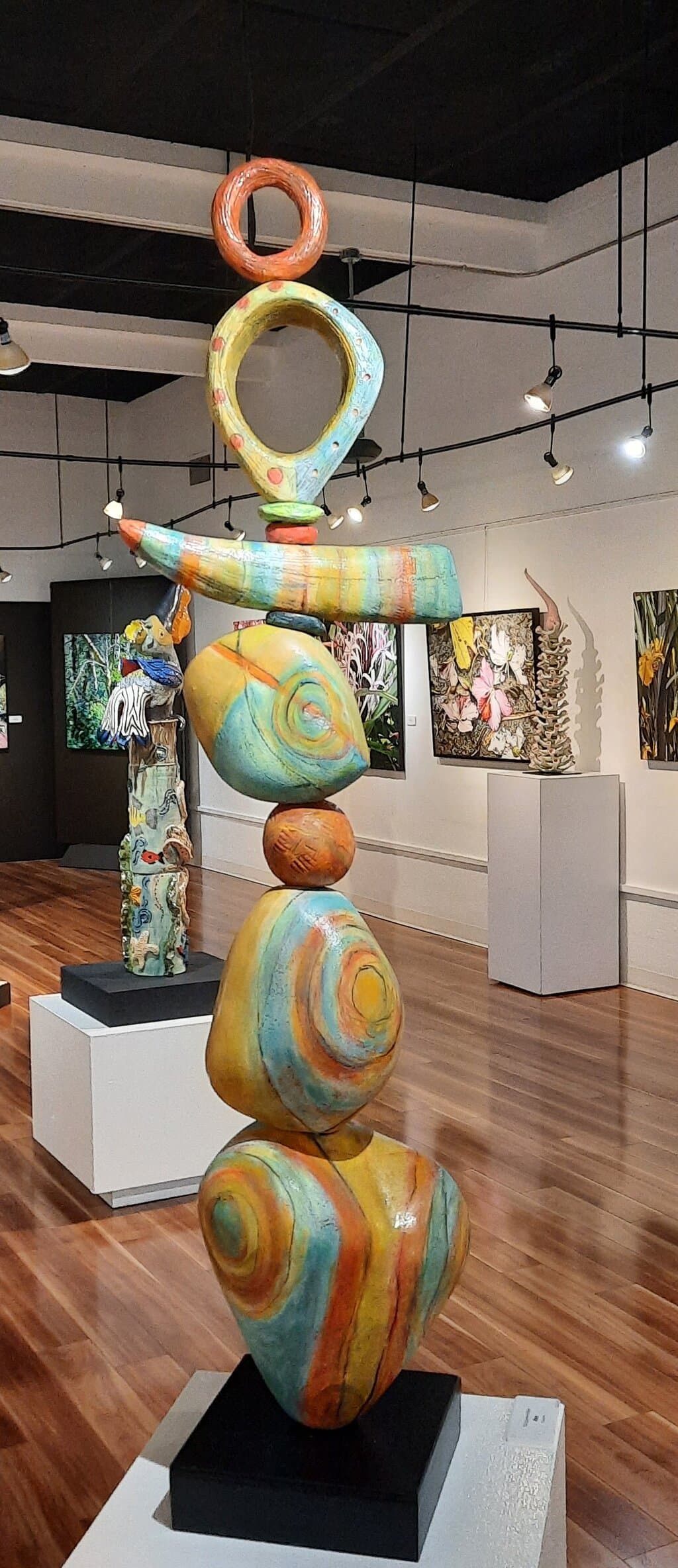 Ceramic totem artist Kim Miller, "Free", showing in the Secret Garden exhibit through January 29, 2021.