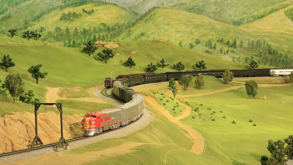 An HO-Scale Model Train winds its way through modeled mountains of central california.