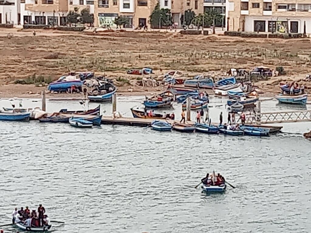 Pedestrians taking ferry boats instead of Hassan bridge, Rabat July 2022