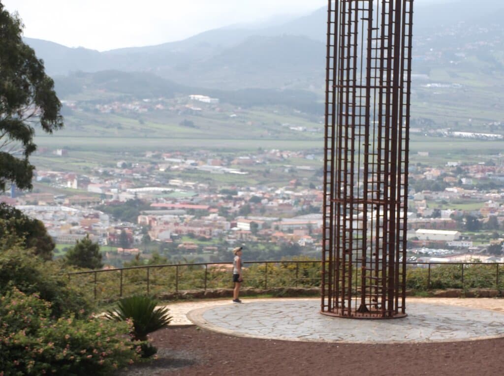 Michelle is dwarfed by the monument.