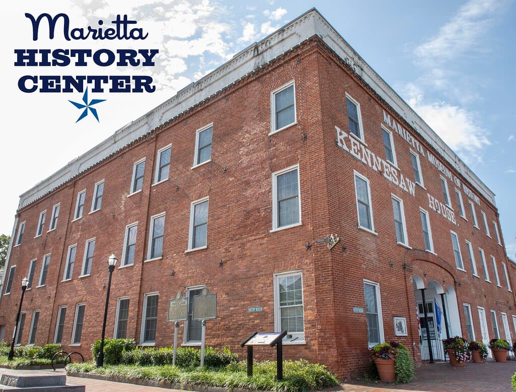 Located in front of the railroad tracks, just one block west of the Marietta Square. The Marietta History Center is a historic 1845 brick building.
