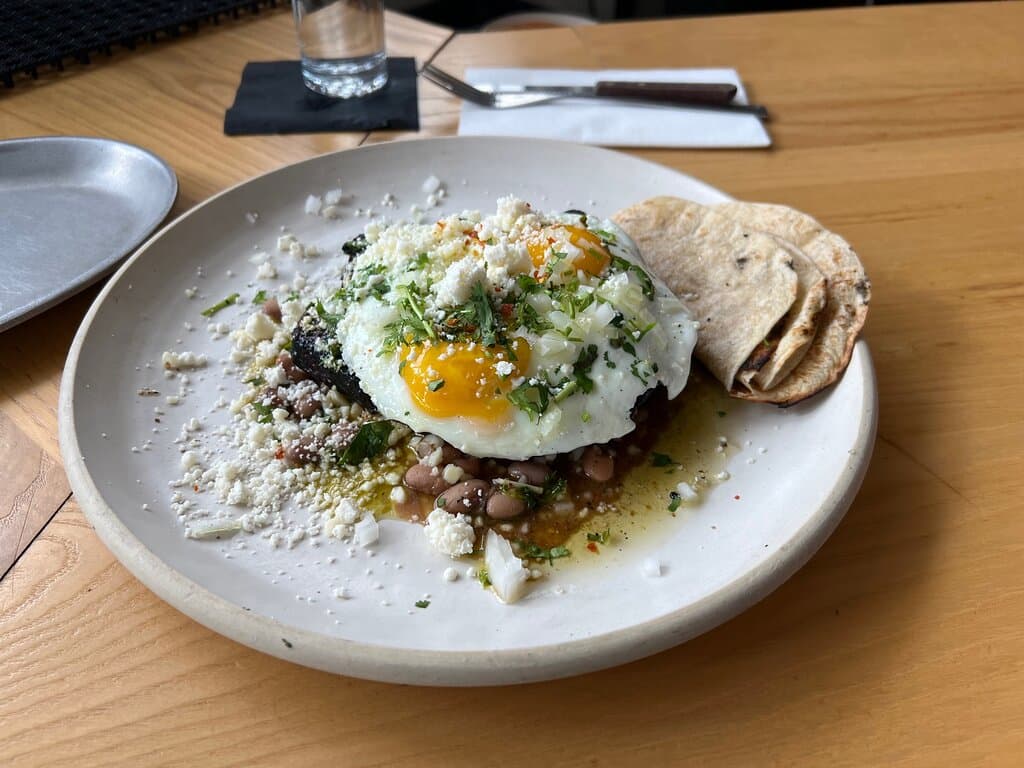 This was an incredible meal! Chuleta con Huevo. Should have + the Papas.