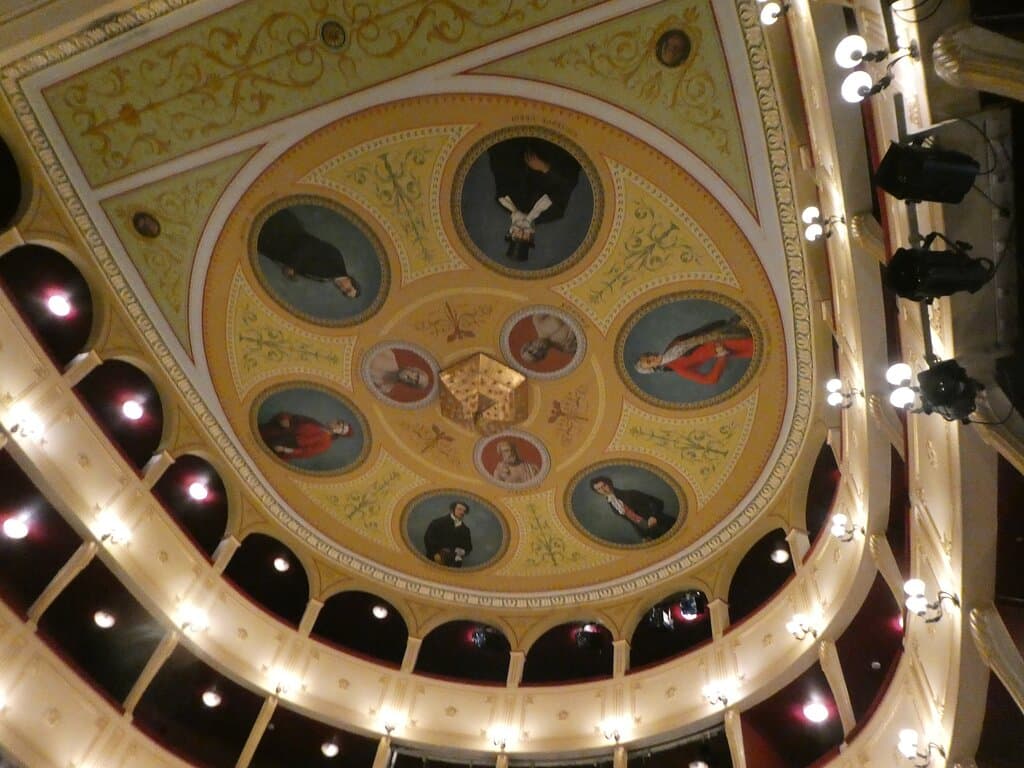 the ceiling frescoes with depiction of famous men